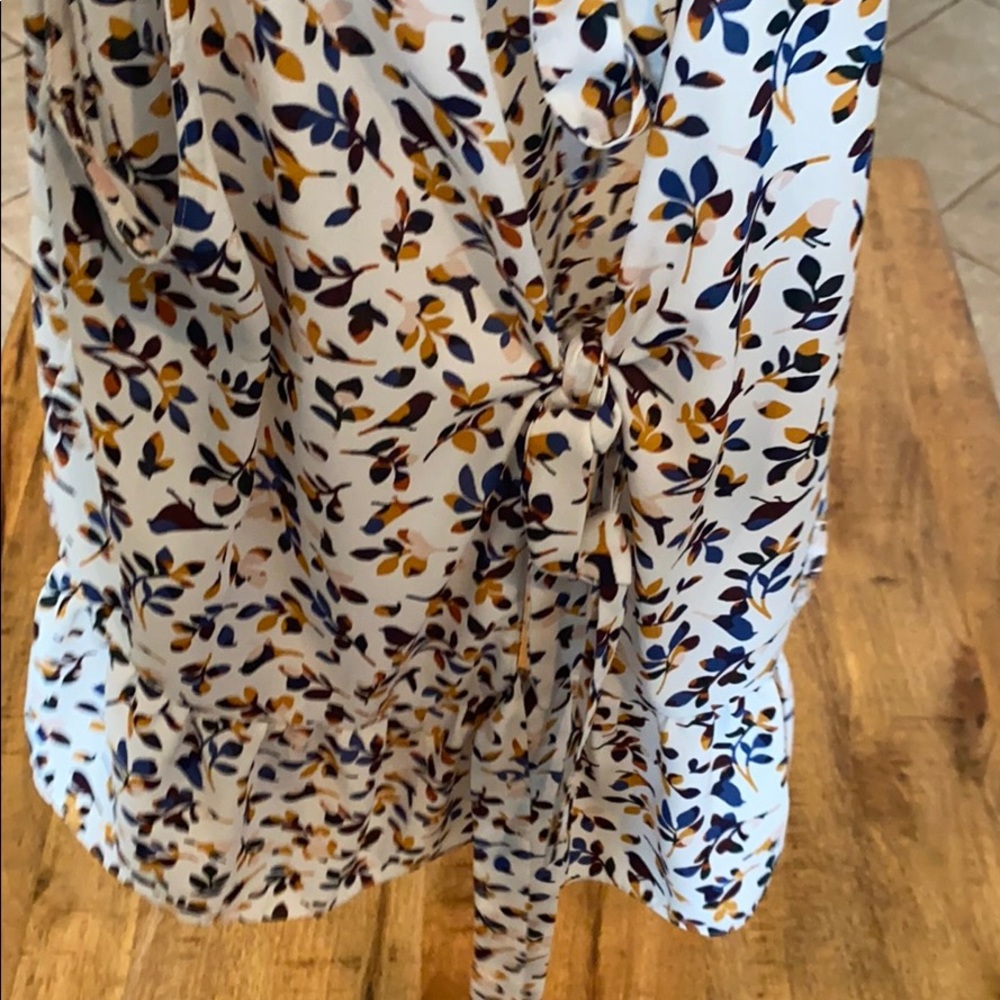 top with open back with ties